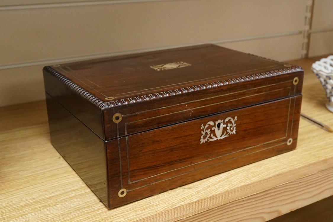 A 19th century rosewood and mother of pearl inlaid work box, 28cm high